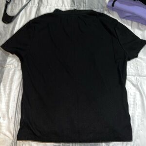 Ribbed black top with high neck